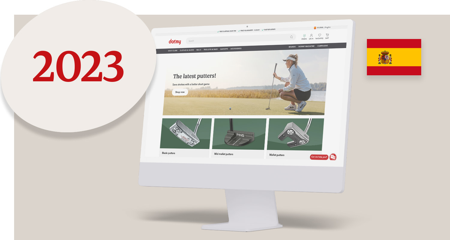 A computer screen displays Dormy's website featuring golf equipment, large text reading "2023", and a Spanish flag in the background.